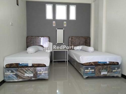 Hotel Boarding House Syariah Mm Bone Redpartner