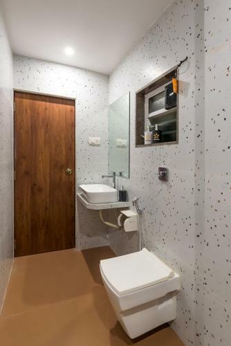 Villa Saffronstays Coral Hues