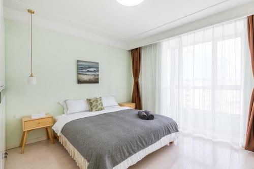 Hotel Qingdao Shinan�wusi Square�