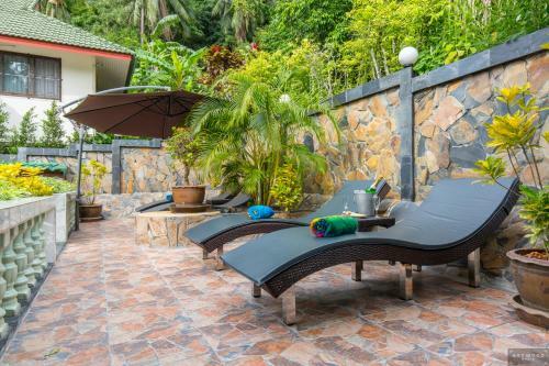 Private Poolvilla Mit Wasserfall