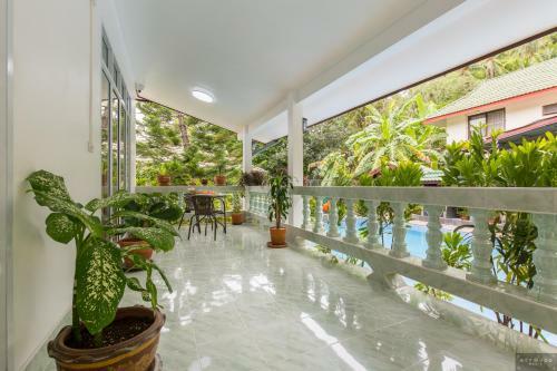 Private Poolvilla Mit Wasserfall