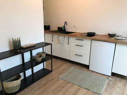 Apartamento Chaleureux Studio Mansard� - C?ur de Ville de S�te