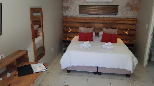 Hostal Touching Senses Garden Cottages