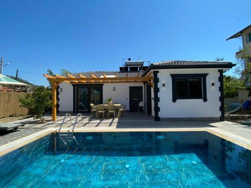 Remarkable Villa With Jacuzzi, Private Pool And Backyard In Fethiye