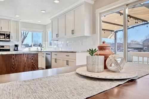 The White Custom Farmhouse 5 Bedroom Home