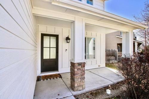 The White Custom Farmhouse 5 Bedroom Home