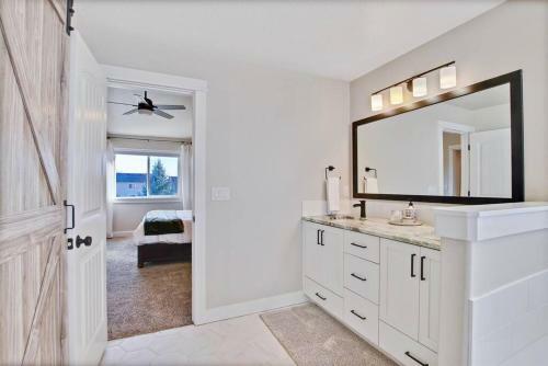 The White Custom Farmhouse 5 Bedroom Home