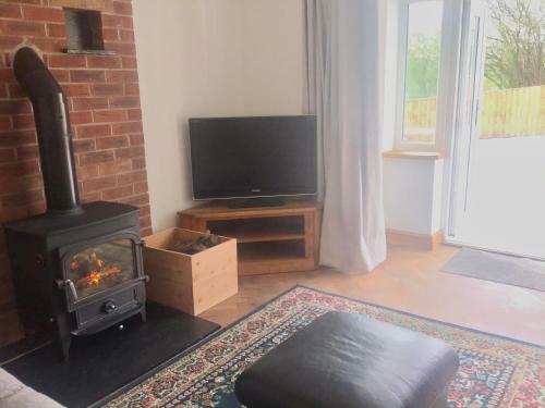 Apartamento 3 Bedroom Bungalow In Llanrhaeadr Ym