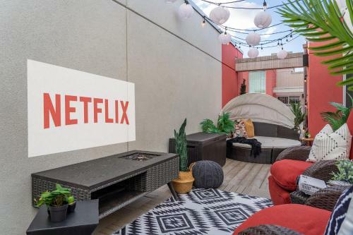 The Noma I Private Rooftop Patio I Marda Loop I Tv