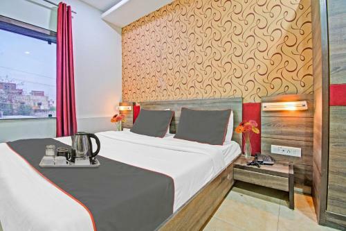 Capital O 91036 Hotel Stanza