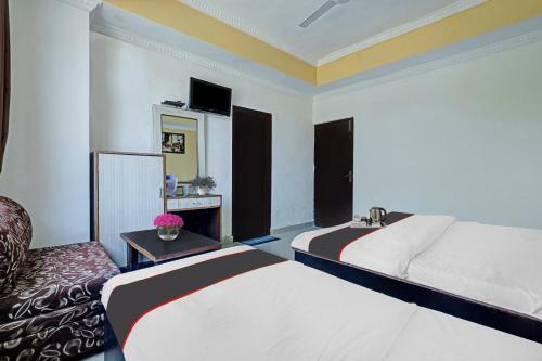 Capital O 90742 Hotel Vidya Residency