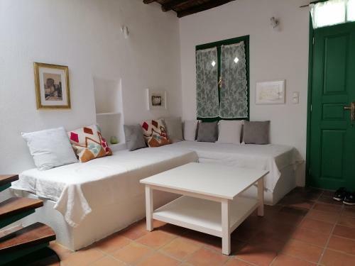 Traditional House In A Settlement In Paros