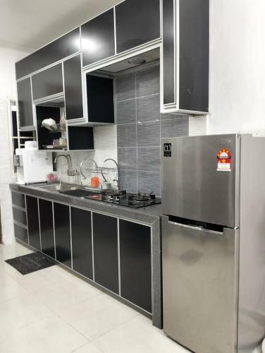 Apartamento Mahsuri Homestay