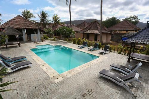 Collection O 1651 Purnama Beach Hotel