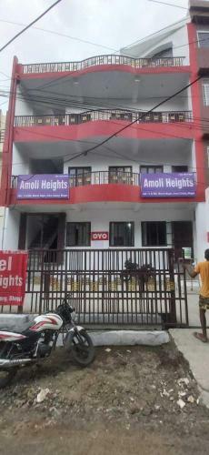 Spot On 91567 Hotel Amoli Heights