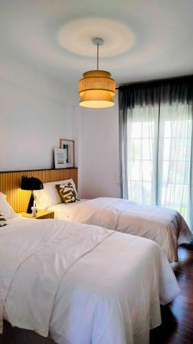Rosa de Ciudad. Chalet C�ntrico Con Mucha Intimidad