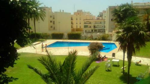 Luminoso Apartamento Playa Torrecilla. Con Piscina