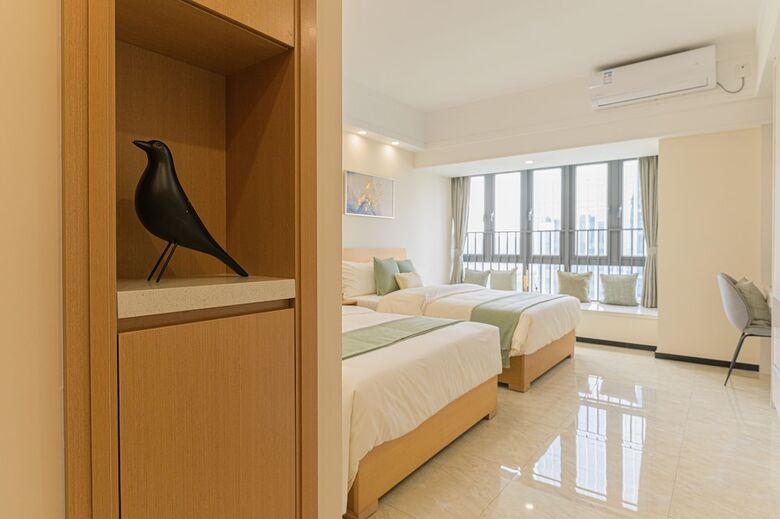 Aparthotel Bainianhui International Apartment