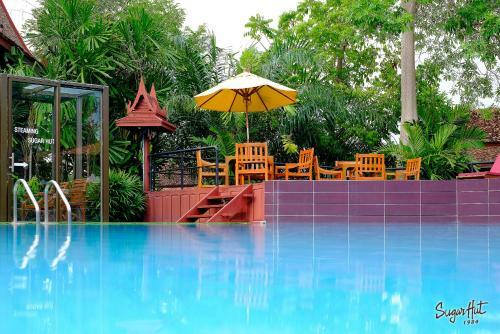 Hotel Sugar Hut Resort & Restaurant