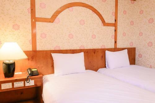 Posada Kiwi Express Hotel - Fengjia
