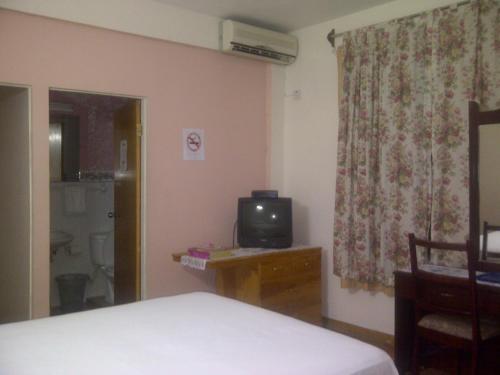 Hostal Palm Bay Guest House & Restaurant