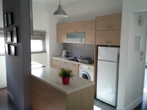 Apartamento The Kapitani Residence