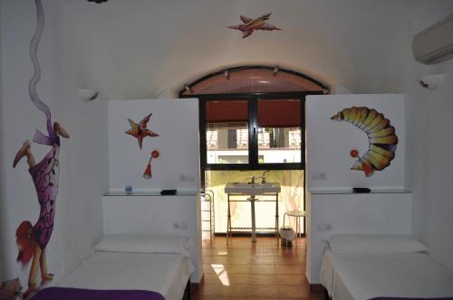 Apartamentos La Casa Pintada