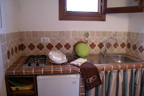 Hostal Agriturismo L'aglientu B&B