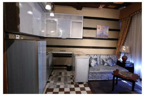 Apartamento Roomi Suites Hotel