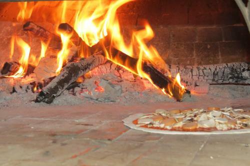 Hostal Pizza Italy Restaurant And Guesthouse