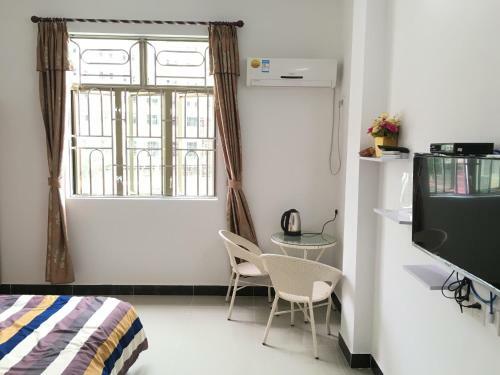 Apartamento Shuangyuewan Happy Inn