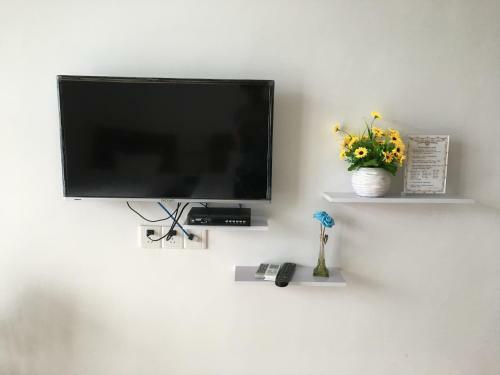 Apartamento Shuangyuewan Happy Inn
