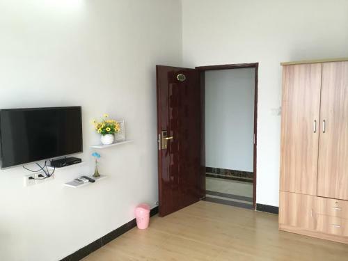 Apartamento Shuangyuewan Happy Inn