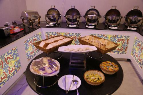 Apartamento Makarm Palm Hotel Suites
