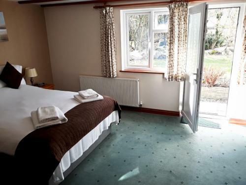 Posada The Crown Inn & Lodges