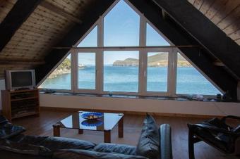 Boat House On The Beach