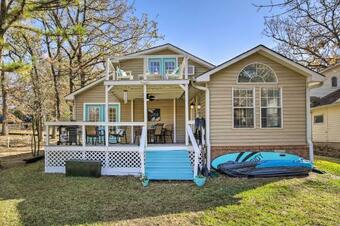 Cozy Cove Tool Home With Canal-facing Balcony