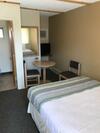 Motel Western 6 Gun